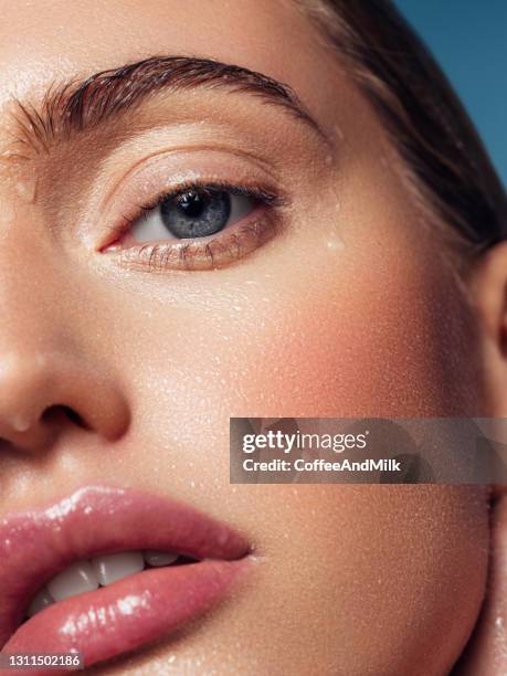 close-up portrait of the beautiful girl - extreme close up mouth stock pictures, royalty-free photos & images