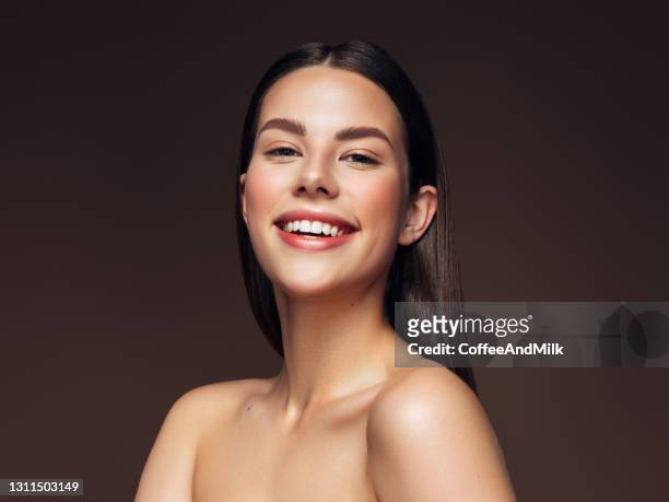 young woman with clean and fresh skin - beautiful woman stock pictures, royalty-free photos & images