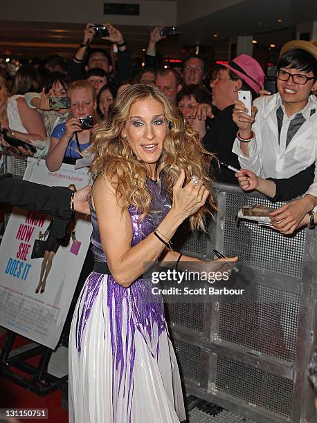 American actress, Sarah Jessica Parker signs autographs for fans as she arrives at the Melbourne premiere of "I Don't Know How She Does It" on...