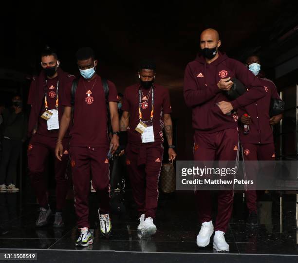 Alex Telles, Amad, Fred, Lee Grant of Manchester United leave the team hotel ahead of the UEFA Europa League Quarter Final First Leg match between...