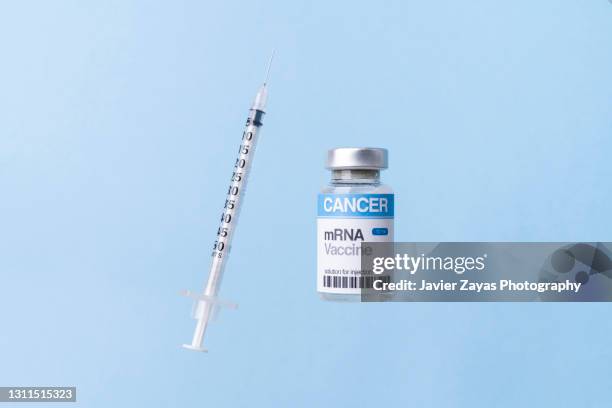 Mrna Vaccine Vial For Cancer Immunotherapy On Blue Background, Stock-Foto