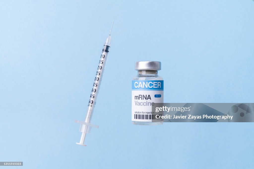MRNA Vaccine Vial For Cancer Immunotherapy On Blue Background