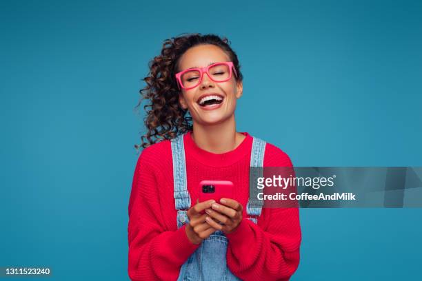 beautiful woman with smart phone - fashion model isolated stock pictures, royalty-free photos & images