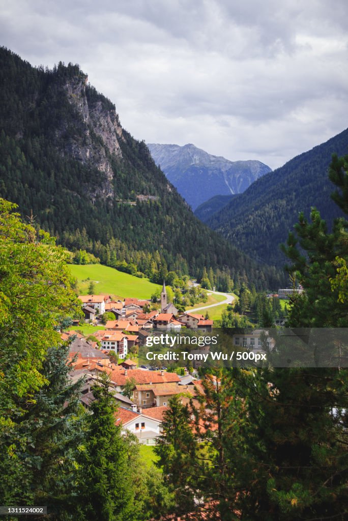 Scenic view of townscape and mountains against sky,Schweiz,Switzerland