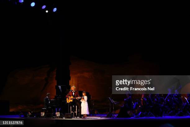Andrea Bocelli performs in concert with his daughter Virginia Bocelli on April 08, 2021 at World Heritage Site Hegra in AlUla near Tabuk, Saudi...