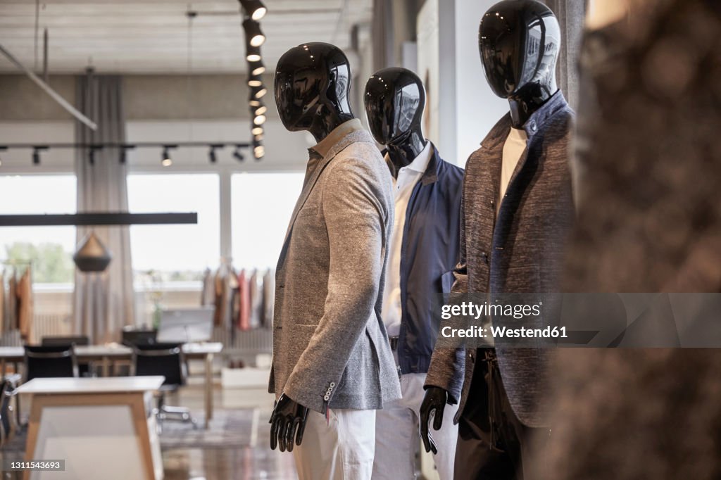 Mannequins wearing business casuals at clothing design studio