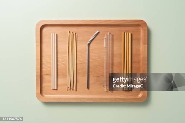 collection of plastic free drinking straws in wood tray - metal drinking straw stock pictures, royalty-free photos & images