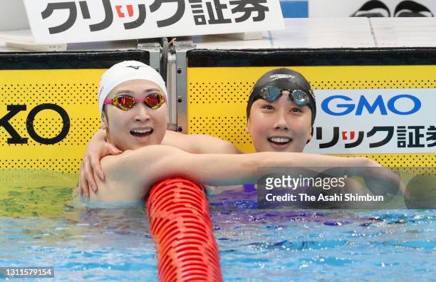 Winner Rikako Ikee and third place Chihiro Igarashi celebrate as they are selected as the Tokyo Olympics Women's 4x100m Freestyle Relay members on...