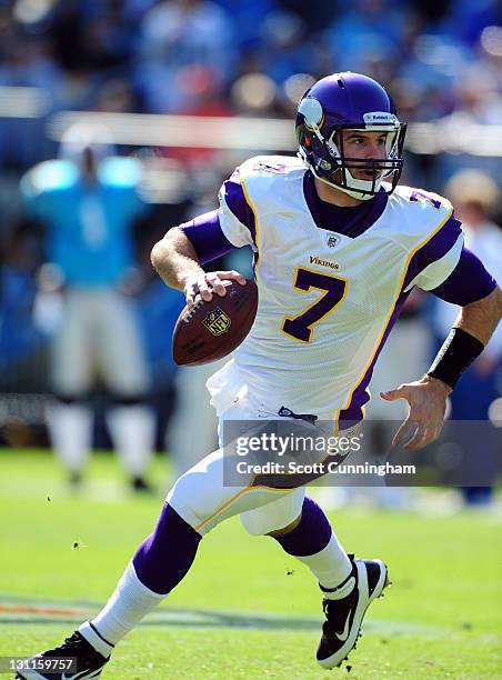 Christian Ponder of the Minnesota Vikings scrambles against the Carolina Panthers at Bank of America Stadium on October 30, 2011 in Charlotte, North...