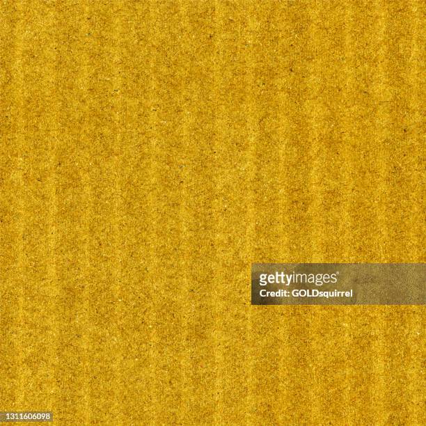 seamless recycled paper with messy grainy visible components and slightly visible vertical lines - vector illustration - abstract pattern design in shades of yellow - gold shimmering paper background.eps - bushy stock illustrations