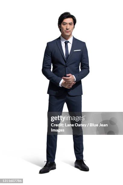 portrait of confident businessman - man suit stock pictures, royalty-free photos & images