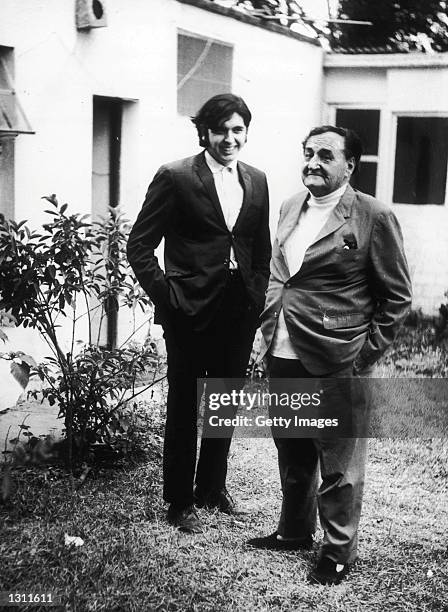 Alan Garcia, left, poses for a photograph with the leader of the APRA political party Raul Haya de la Torre in an undated photo. Peruvian...