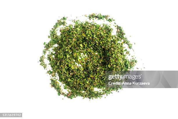 mixed dried herbs isolated on white background - origano foto e immagini stock