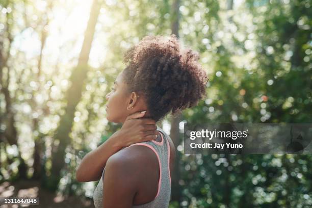 stretching always results in me pulling a muscle - neck stock pictures, royalty-free photos & images