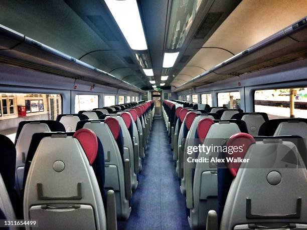 modern passenger train interior - empty seat stock pictures, royalty-free photos & images