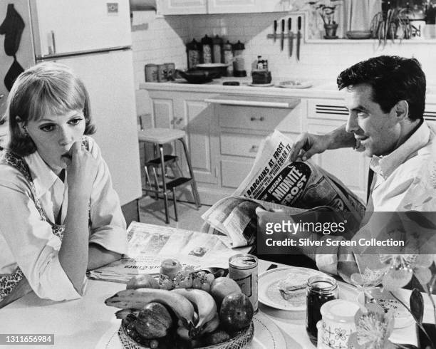 American actor, film director, and screenwriter John Cassavetes as 'Guy Woodhouse' and American actress, activist, and former fashion model Mia...