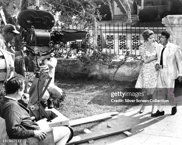 Crew filming American actress Geraldine Page and American singer, actor, and comedian Dean Martin in drama film 'Toys in the Attic', 1963.