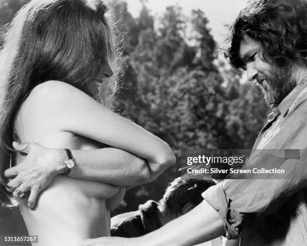 Actors Isela Vega as Elita and Kris Kristofferson as Biker in film 'Bring Me the Head of Alfredo Garcia'.