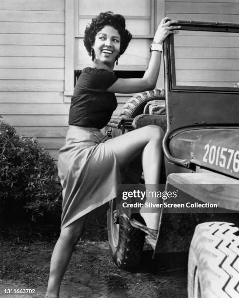 Actress Dorothy Dandridge as 'Carmen Jones' in musical film 'Carmen Jones', 1954.