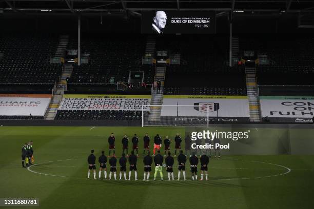 Players of Fulham and Wolverhampton Wanderers participate in two minutes' silence to honor Prince Philip, Duke of Edinburgh prior to the Sky Bet...