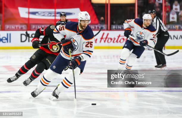 Darnell Nurse of the Edmonton Oilers skates against the Ottawa Senators at Canadian Tire Centre on April 7, 2021 in Ottawa, Ontario, Canada.