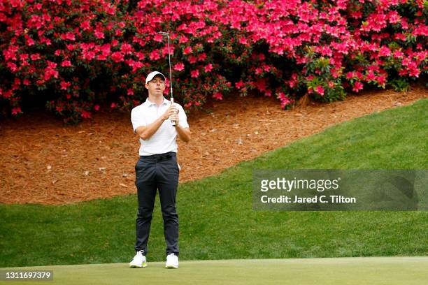 Rory McIlroy of Northern Ireland reacts to missing a putt on the 13th green during the second round of the Masters at Augusta National Golf Club on...