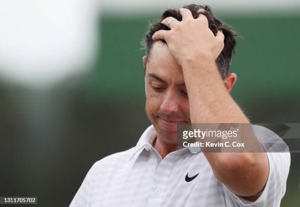 Rory McIlroy of Northern Ireland reacts on the 18th green during the second round of the Masters at Augusta National Golf Club on April 09, 2021 in...