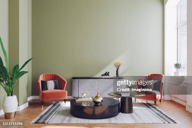 pastell farbige moderne mid century wohnzimmer interieur - wand grün stock-fotos und bilder