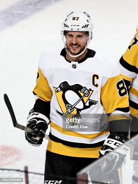 Sidney Crosby of the Pittsburgh Penguins celebrates the win over the New Jersey Devils at Prudential Center on April 09, 2021 in Newark, New...