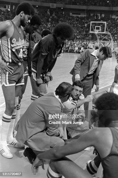 Indiana Pacers assistant coach Jerry Oliver talks to the team in a huddle during an ABA basketball game against the Denver Nuggets at McNichols Arena...