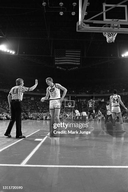 Referee Jesse Kersey signals a foul to the scorer’s bench as center Dan Issel argues the call during a Denver Nuggets ABA basketball game with the...