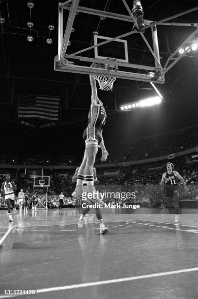 Indiana Pacers guard Don Buse dunks the ball during an ABA basketball game against the Denver Nuggets at McNichols Arena on March 26, 1976 in Denver,...