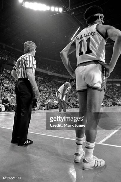 Referee Jesse Kersey looks downcourt from the sideline during an ABA basketball game between the Denver Nuggets and the Indiana Pacers at McNichols...