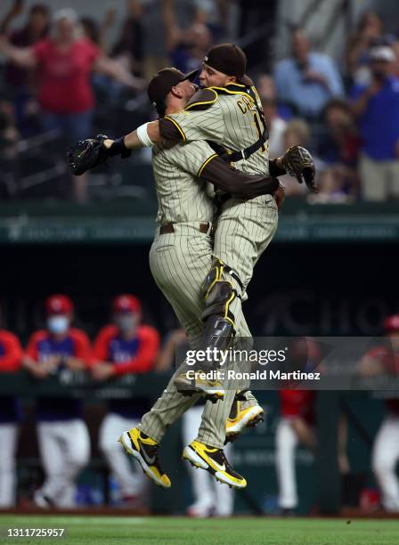 Joe Musgrove of the San Diego Padres celebrates with Victor Caratini after pitching a no-hitter against the Texas Rangers at Globe Life Field on...