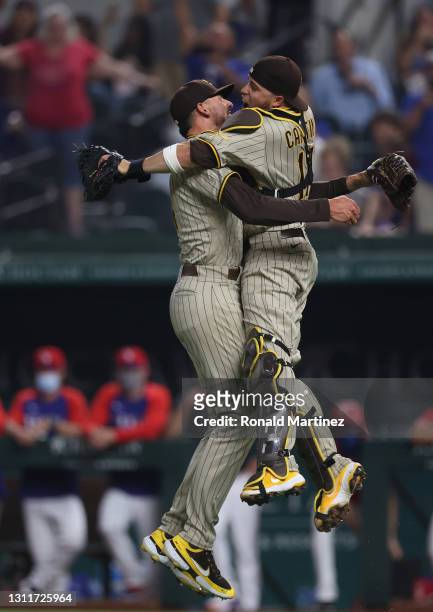 Joe Musgrove of the San Diego Padres celebrates with Victor Caratini after pitching a no-hitter against the Texas Rangers at Globe Life Field on...