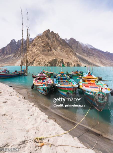 natural view along attabad lake in pakistan mountains at hunza valley - islamabad stock pictures, royalty-free photos & images