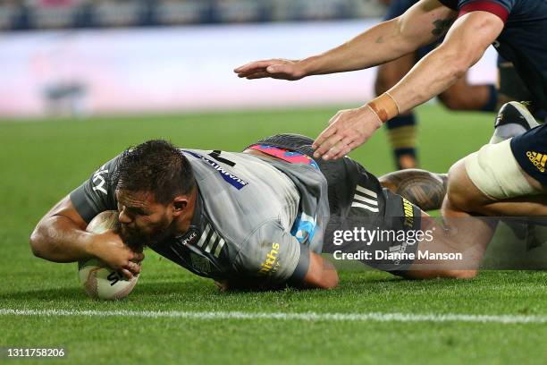 Angus Ta'avo of the Chiefs dives over to score a try during the round seven Super Rugby Aotearoa match between the Highlanders and the Chiefs at...