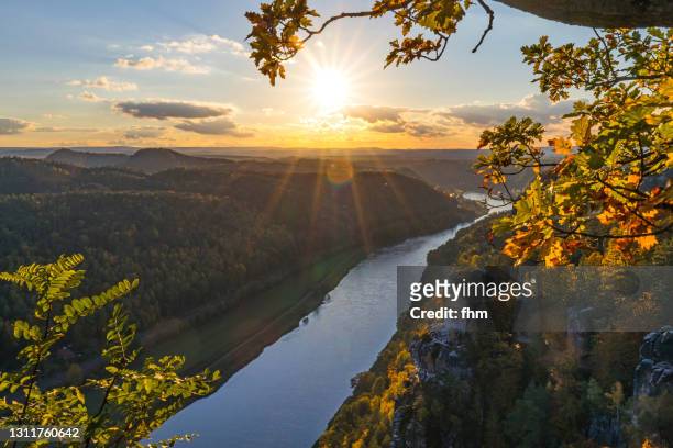 sunset in the elbe sandstone mountains (german: elbsandsteingebirge), saxony/ germany - elbe bildbanksfoton och bilder