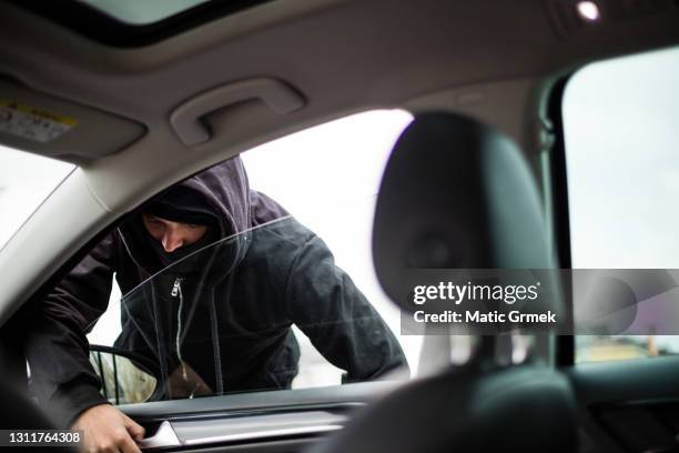 vol de voiture - voler photos et images de collection