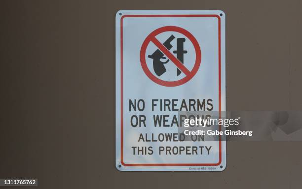 signs: no firearms or weapons allowed on this property - gun control stock pictures, royalty-free photos & images