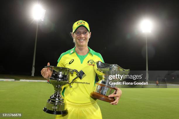 Meg Lanning, captain of Australia with the winning trophies during game three of the One Day International series between the New Zealand White Ferns...
