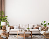 farmhouse interior living room, empty wall mockup in white room with wooden furniture and lots of green plants