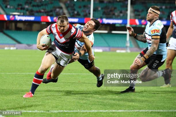 Brett Morris of the Roosters scores a try during the round five NRL match between the Sydney Roosters and the Cronulla Sharks at Sydney Cricket...