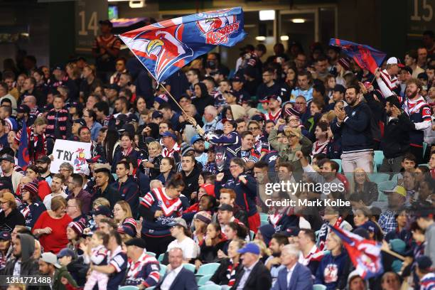 Roosters supporters cheer during the round five NRL match between the Sydney Roosters and the Cronulla Sharks at Sydney Cricket Ground, on April 10...