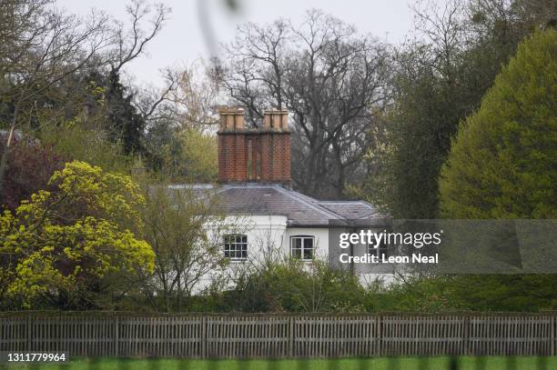 General view of the exterior of Frogmore Cottage as people lay floral tributes to Prince Philip, Duke Of Edinburgh who died at age 99, nearby on...