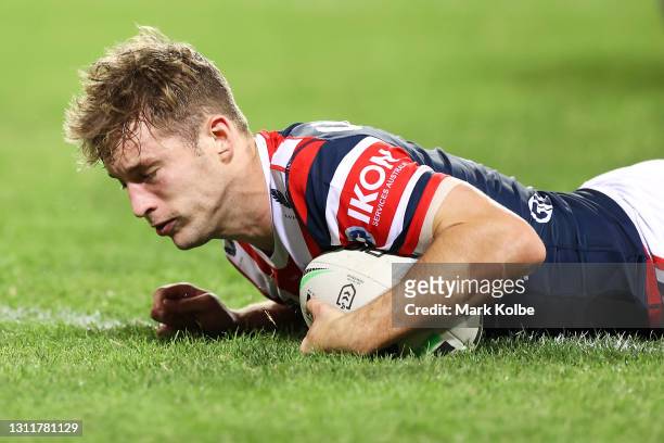Sam Walker of the Roosters scores a try during the round five NRL match between the Sydney Roosters and the Cronulla Sharks at Sydney Cricket Ground,...