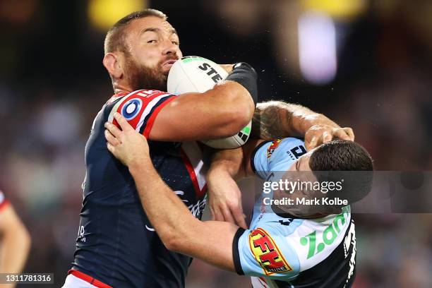 Jared Waerea-Hargreaves of the Roosters is tackled by Chad Townsend of the Sharks during the round five NRL match between the Sydney Roosters and the...