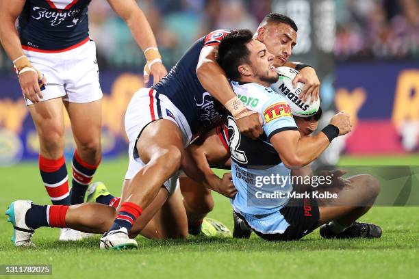 Mawene Hiroti of the Sharks is tackled during the round five NRL match between the Sydney Roosters and the Cronulla Sharks at Sydney Cricket Ground,...