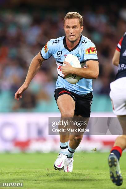 Matt Moylan of the Sharks is runs the ball during the round five NRL match between the Sydney Roosters and the Cronulla Sharks at Sydney Cricket...