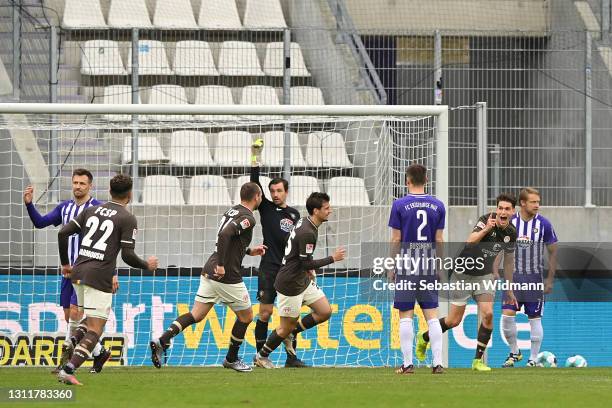 Luca Zander of St Pauli celebrates after scoring their team's third goal during the Second Bundesliga match between FC Erzgebirge Aue and FC St....